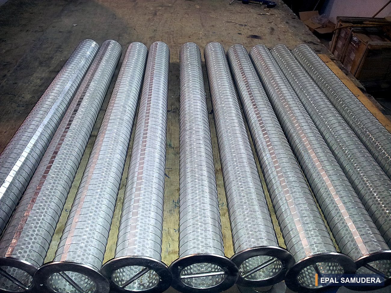 Perforated riser elements, mesh lined